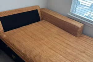 Corduroy couch after heavy dirt cleaning and upholstery treatment with a cleaner and more refreshed fabric surface in Atlanta, GA.