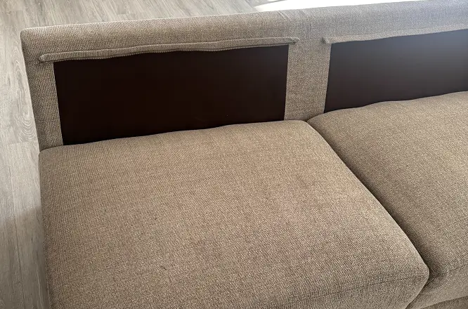 Couch cushion after heavy dirt cleaning and upholstery treatment with visibly improved fabric appearance in Atlanta, GA