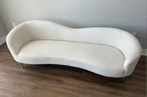 Bright white sofa after green upholstery cleaning, pet stains and odor removed by Couch Steamers technicians