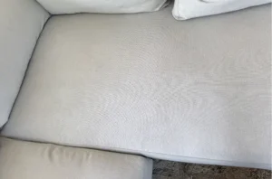 Light gray couch after pet stain and couch cleaning in Portland, OR, with even color and no visible marks left behind.