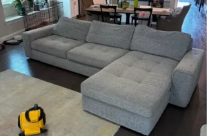 Gray sectional after our upholstery cleaning services in Denver, CO, with soft, even fabric and a like new look.